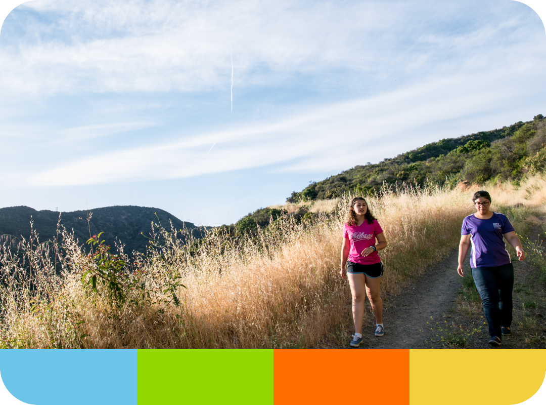 Students hiking on a trail.